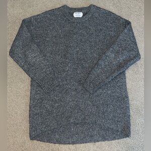 Dark grey oversized sweater.